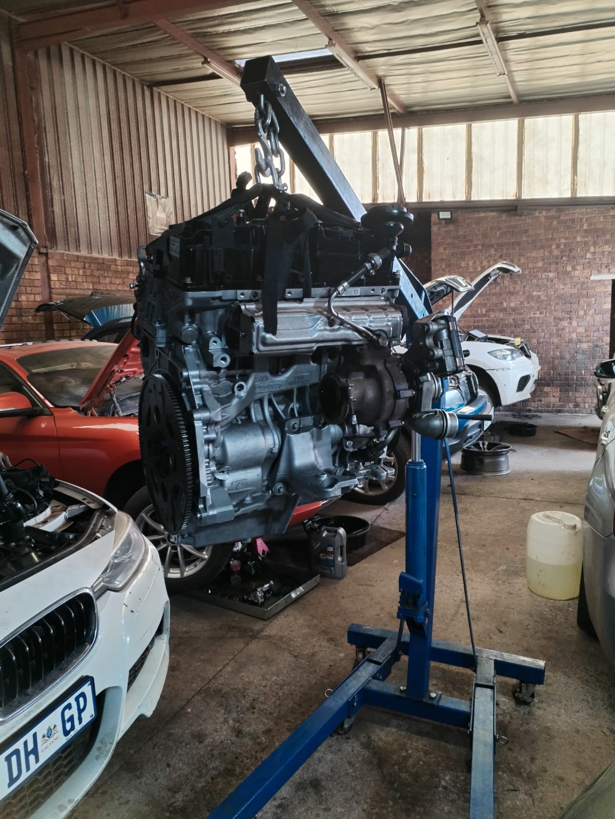 Mechanic working on engine